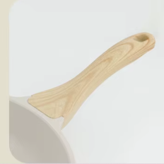 poêle_céramique_beige manche_en_bois